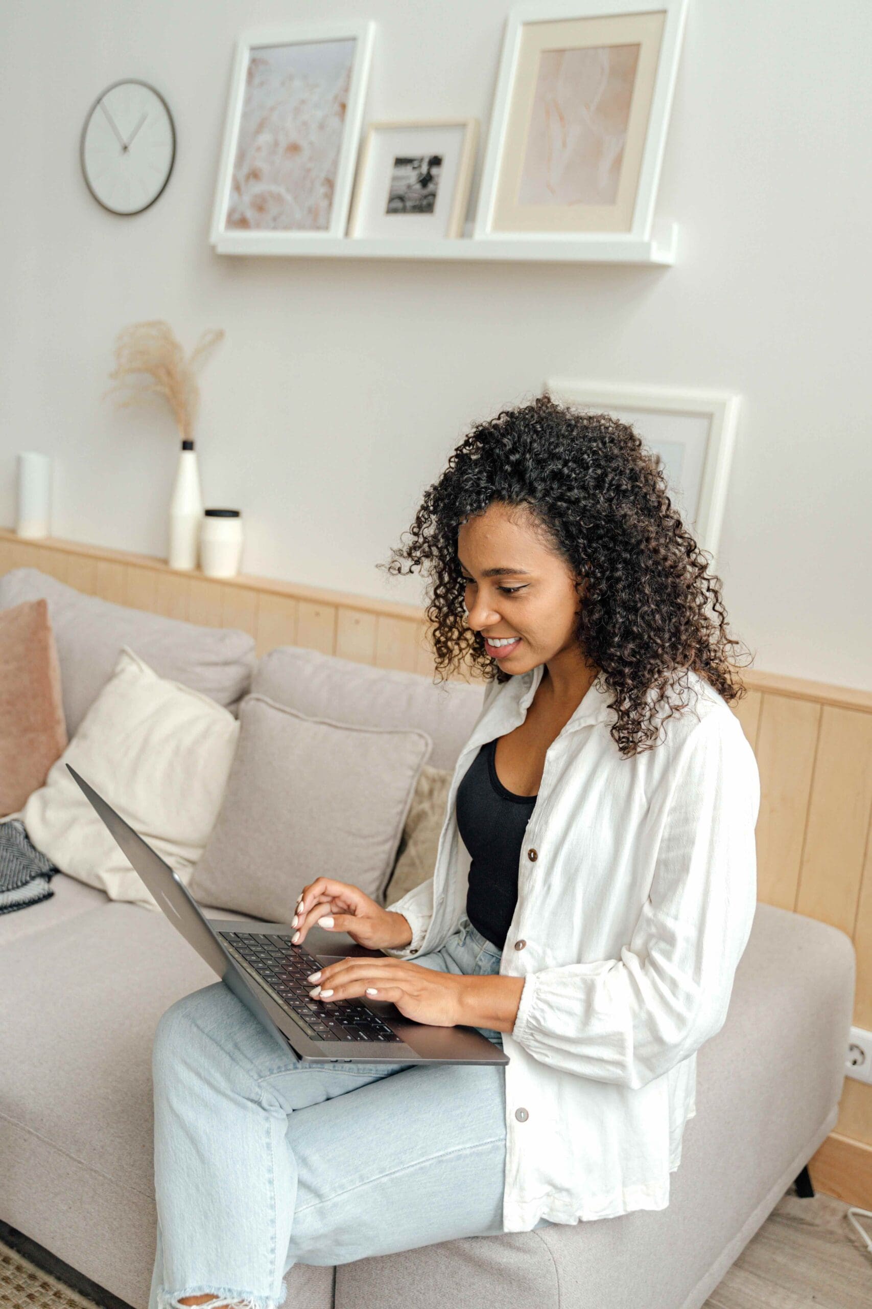 Woman working on a laptop, representing arKardia's Custom Consultative Suite, an alternative to individual therapy for professionals seeking guidance.
