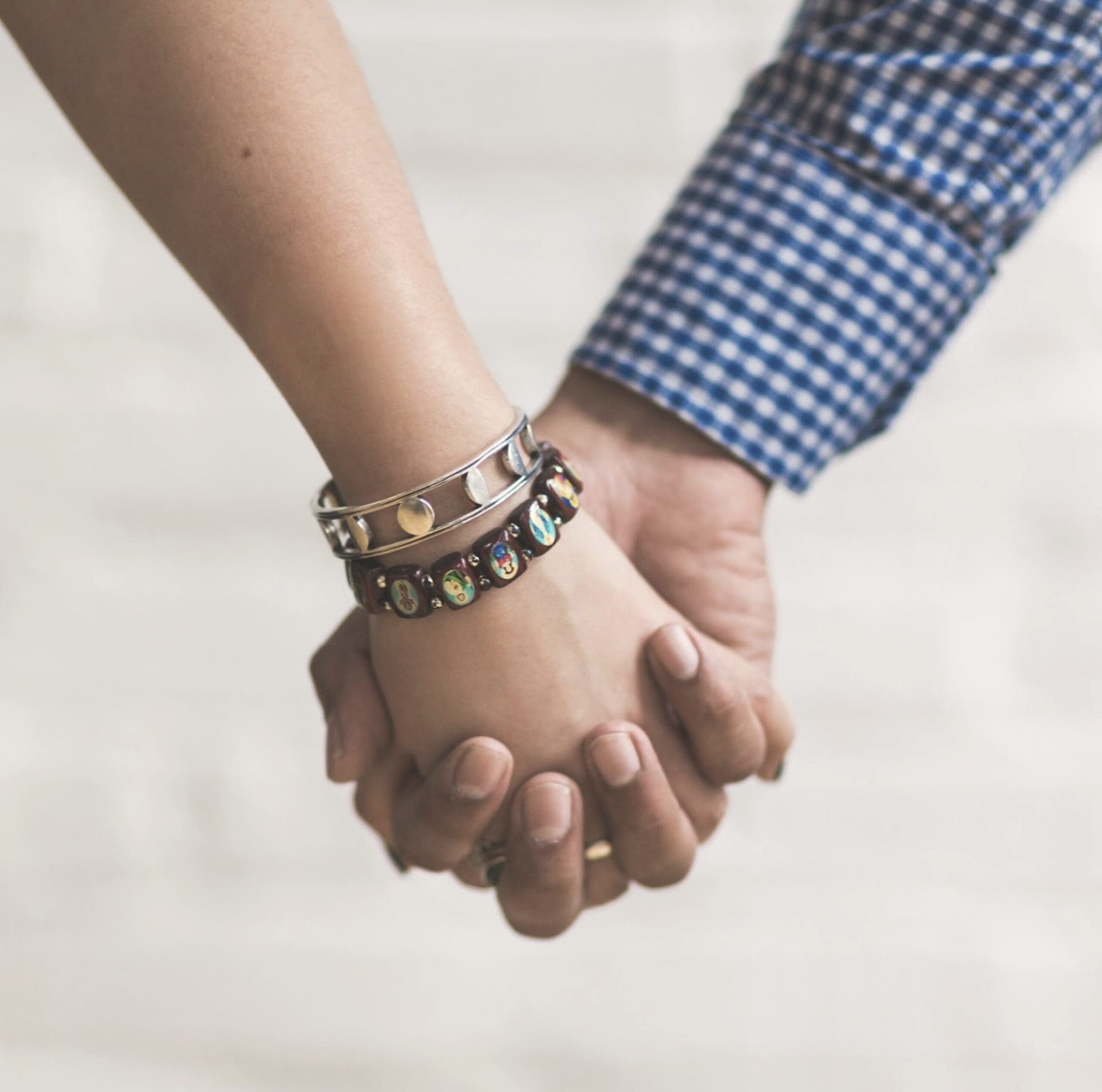 Couple holding hands, representing the trust rebuilt through relationship therapy at arKardia in Gettysburg, PA.